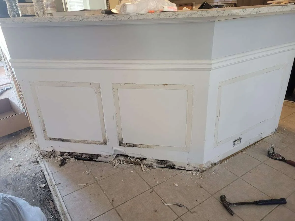 Water damage and mold on kitchen during Storm Damage Restoration in Portage Lakes